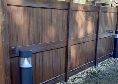 Commercial embossed wood grain vinyl fence